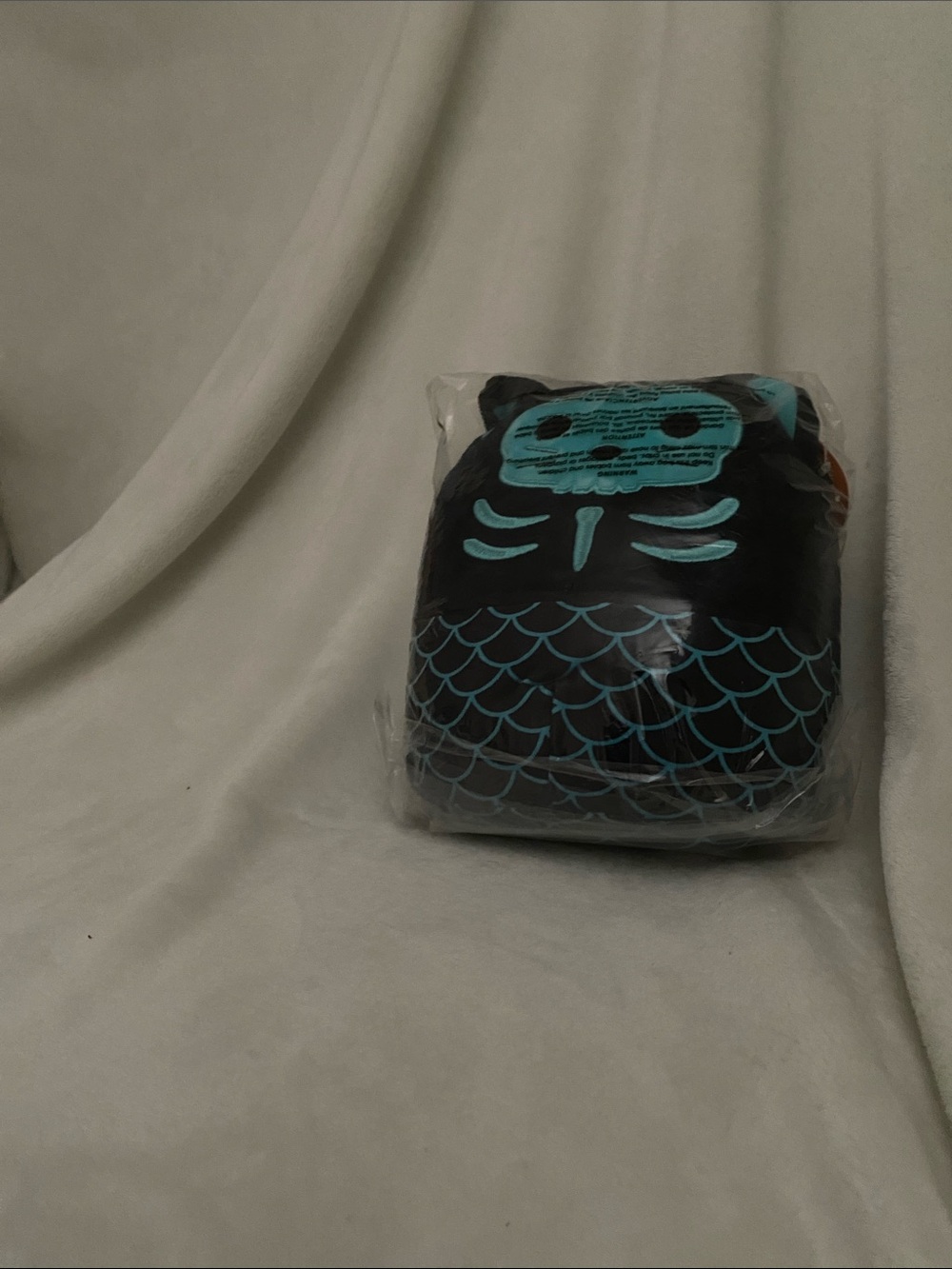 Squishmallows Black Plush with Teal Graphic Accents